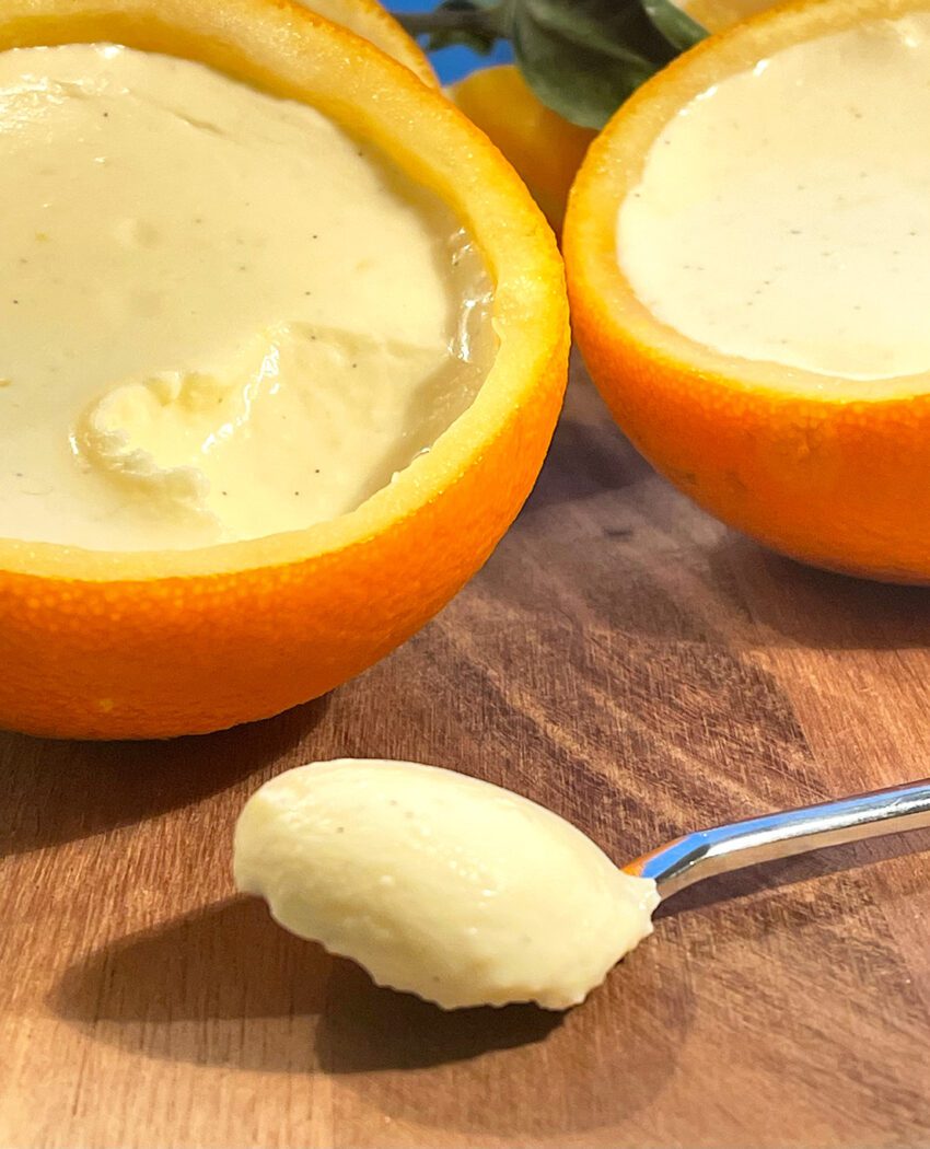 orange posset on a spoon