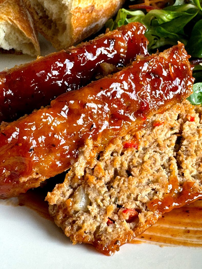 A closeup of homemade meatloaf on a plate